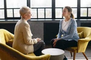 person reaping benefits of cognitive behavioral therapy in counseling 