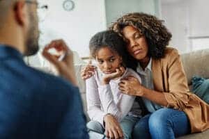 family in counseling as part of a trauma therapy treatment program